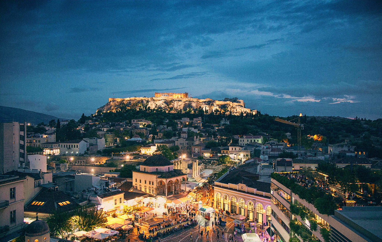 Athens by night with illuminated Acropolis